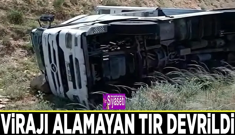 Virajı alamayan TIR devrildi